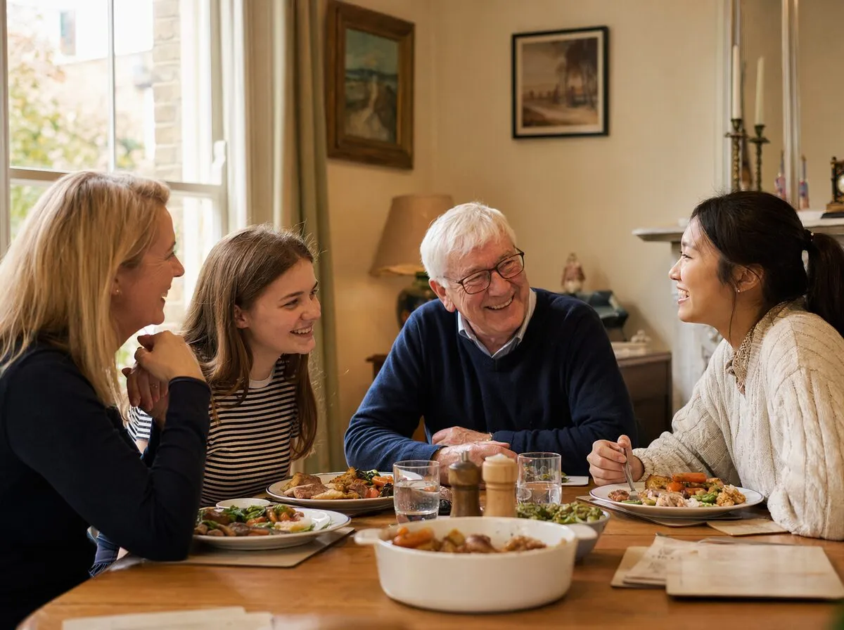 A host family sharing lunch with a guest around the table